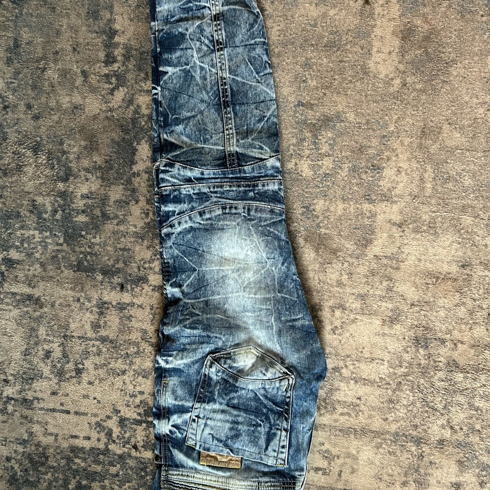 Blue Relaxed Fit Jeans with Distressed Details